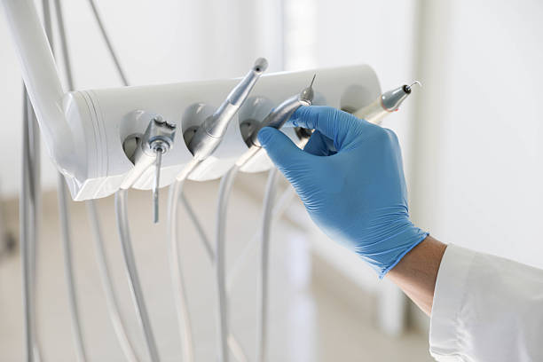 Professional Tooth Extraction technician working in Belfast, ME